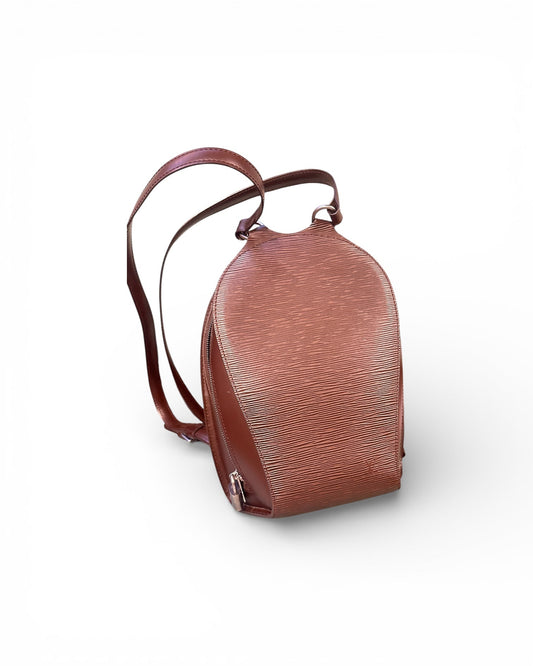 Brown leather backpack on a white background